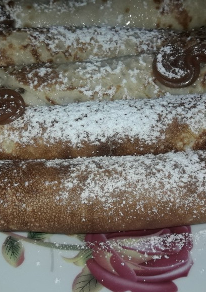 Una foto de Panqueques o Crepes con dulce de leche