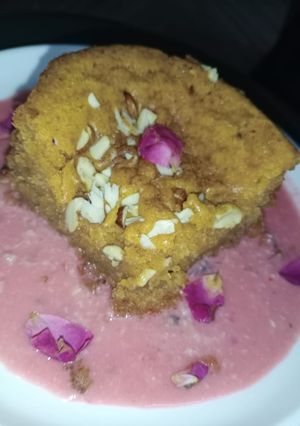 A picture of Mawa cake in rose flavoured rabri.
