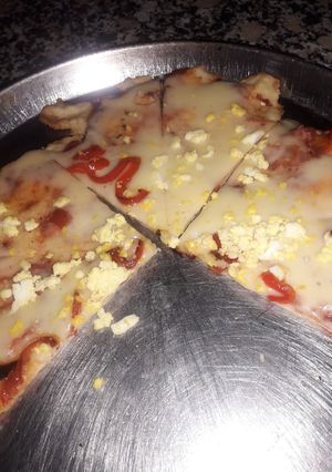 Una foto de Pizza con harina leudante
