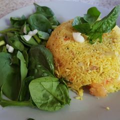 A picture of My Saffron tumeric Rice with cod, prawns and veg.
