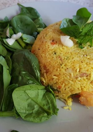 A picture of My Saffron tumeric Rice with cod, prawns and veg.