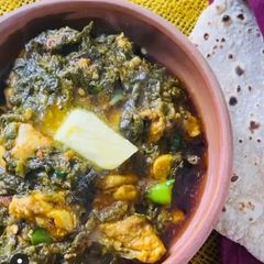 A picture of Palak chicken.