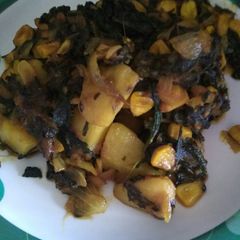 A picture of Spinach potato corn stir fry.