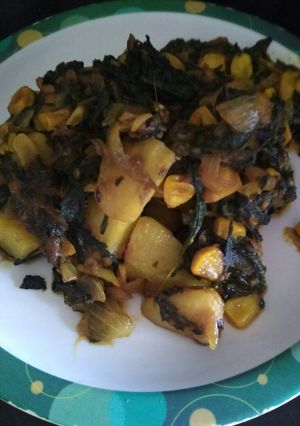 A picture of Spinach potato corn stir fry.