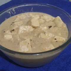 Paneer in white gravy A picture of Paneer in white gravy.
