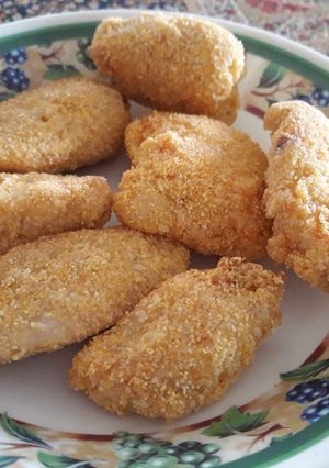 Una foto de Nuggets rebozadas con polenta