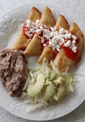 Una foto de Tacos dorados de queso