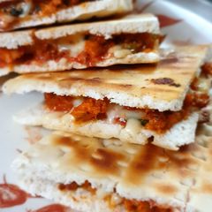 A picture of Stuffed chicken pizza.