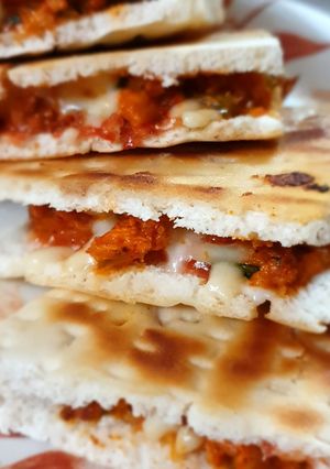 A picture of Stuffed chicken pizza.