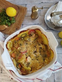 Halfilé zöldségekkel és burgonyával csőben sütve recept fotója