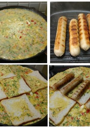 A picture of Cheesy omlet with bread and chi. sausages.