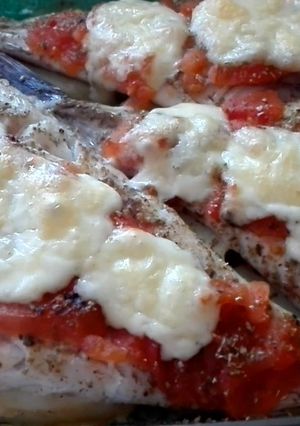 Una foto de Merluza al horno con papas y verduras