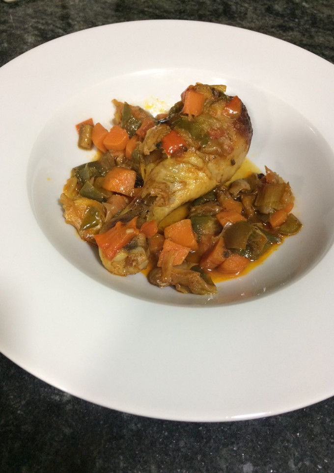 Una foto de Muslos de pollo al horno