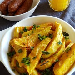 Deep Fried Crunchy Spiced Rosemary Potato Wedges #passonbutton A picture of Deep Fried Crunchy Spiced Rosemary Potato Wedges #passonbutton.