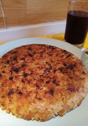 Una foto de Tacu Tacu de Frejol Canario con Trucha frita y Ensalada