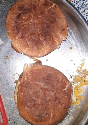 A picture of Yummy tasty tawa burger.
