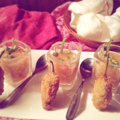 A picture of Hot and sour soup with Peri bites.
