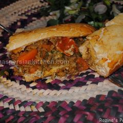 A picture of Persian pan fired kebab with aubergine sauce کباب تابه ای با سس بادمجان.