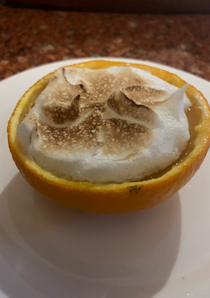 Una foto de CREMA de NARANJA con MERENGUE