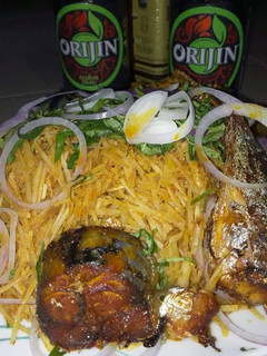 A picture of Abacha with fried titus fish.