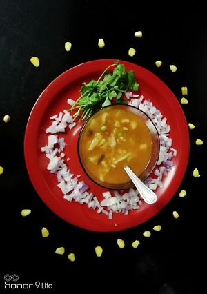 A picture of Mix veg Tomato corn soup.