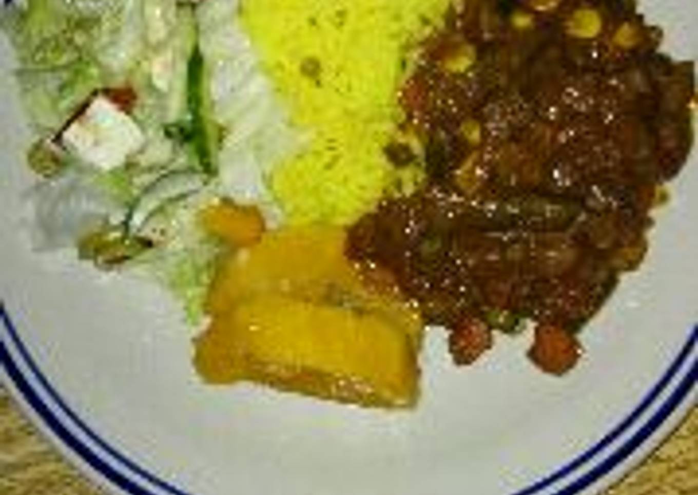 Homemade beef kidney stew and yellow rice