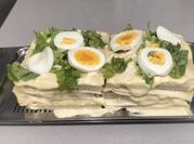 Una foto de pastel de atún y jamón