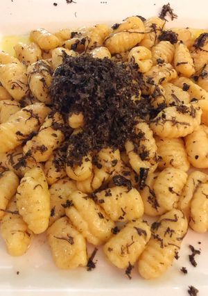 A picture of Black truffle ricotta gnocchi.