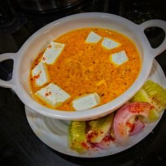A picture of Restaurant Style Gravy (Paneer).