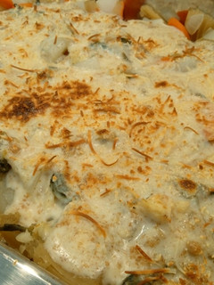 Una foto de Bacalao y verduras con bechamel