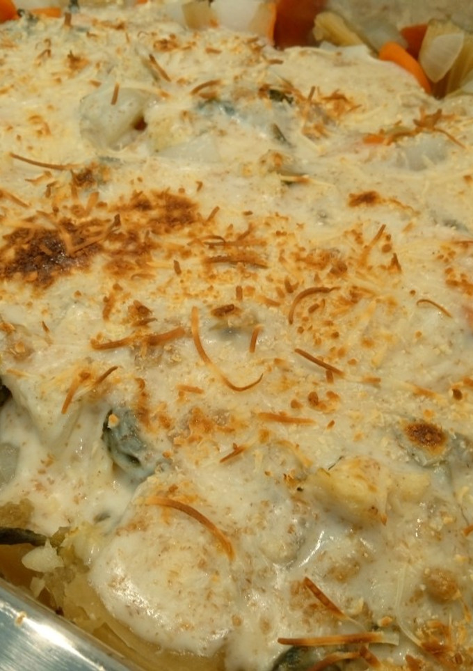Una foto de Bacalao y verduras con bechamel