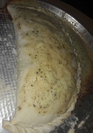 Una foto de Calzone de Jamón y Queso
