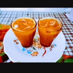 A picture of Tasty yummy mango ice tea.