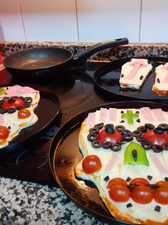 Una foto de La noche de difuntos (pizzas para Halloween)
