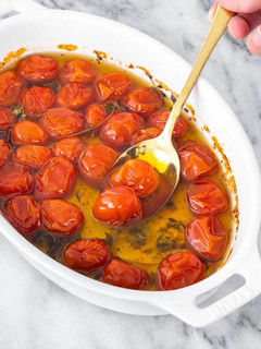 Una foto de Tomates confitados