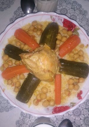 A picture of Couscous with Red Sauce.