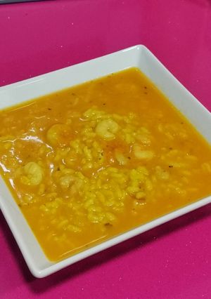 Una foto de Arroz caldoso con gambas
