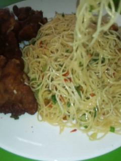 A picture of Jollof spaghetti.