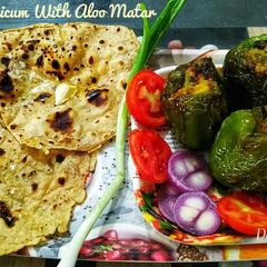 A picture of Stuffed Capsicum With Aloo Matar.