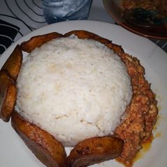 Buttered Rice, Egg Sauce and Fried Plantain #teamabuja A picture of Buttered Rice, Egg Sauce and Fried Plantain #teamabuja.