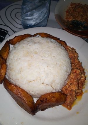 A picture of Buttered Rice, Egg Sauce and Fried Plantain #teamabuja.