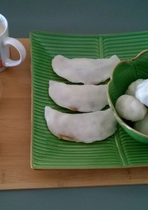 A picture of Kozhukatta/ Steamed rice dumplings with coconut-jaggery filling.