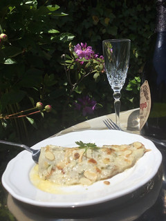 Una foto de Merluza gratinada