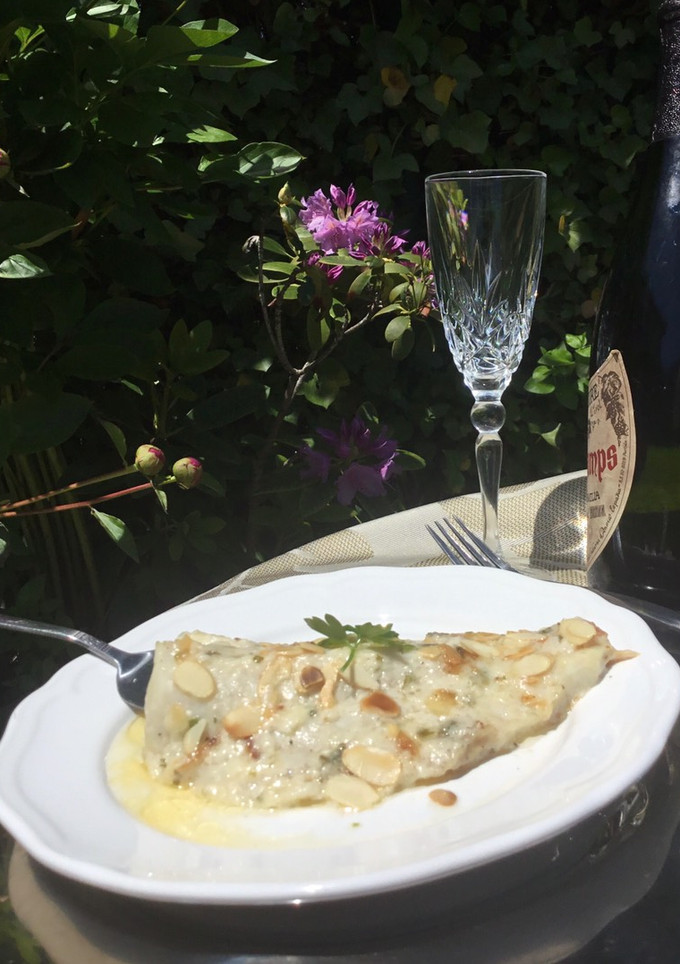 Una foto de Merluza gratinada