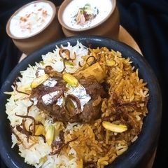 A picture of Mughlai mutton biryani.