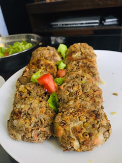 Una foto de Milanesa de lentejas