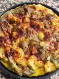 Pizza vegana con base de avena y chía y patata con guarnición setas 'A feira'