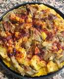 Pizza vegana con base de avena y chía y patata con guarnición setas 'A feira'
