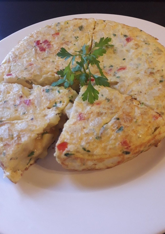 Una foto de Tortilla de papas guisadas