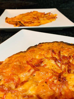 Una foto de Pizza de calabaza y jamón serrano